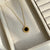 Black Round Roman Pendant