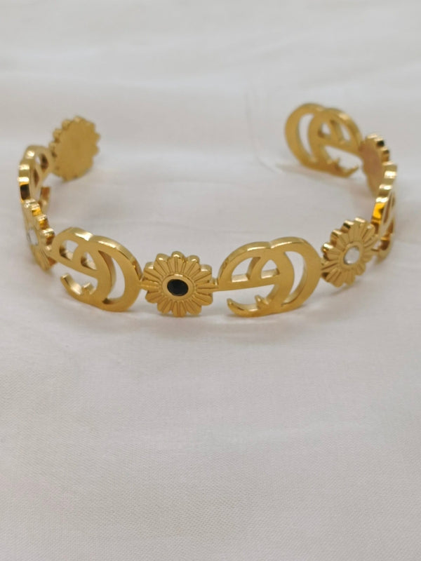 Golden Bracelet with Gucci-Inspired Logo and Floral Design