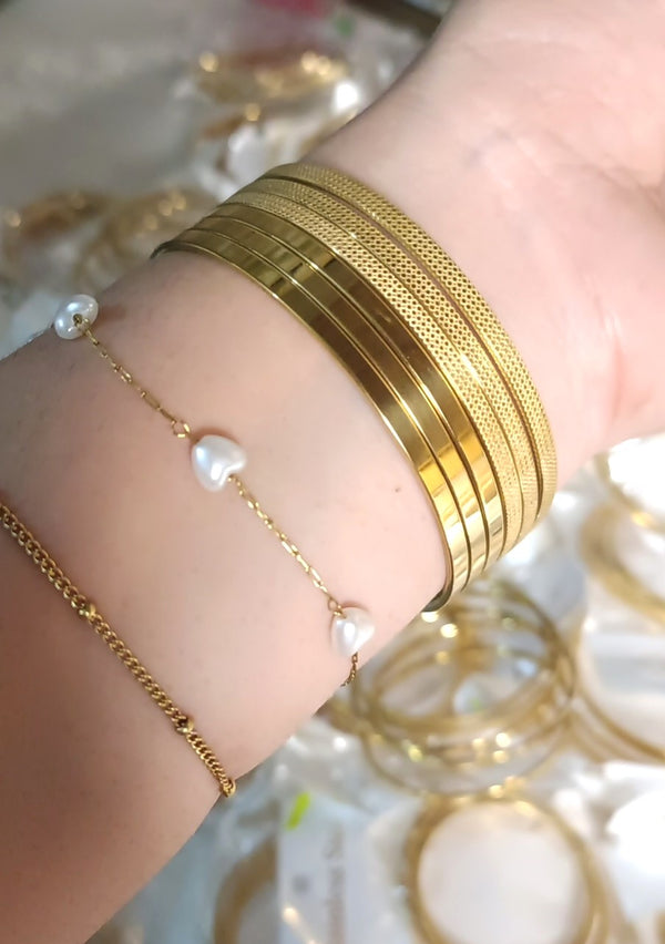 21 karat gold plated stainless bangles