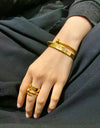 Nail and Cartier Bangle and Ring Stack