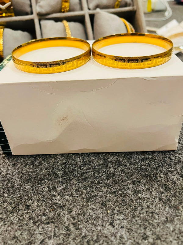Brand inspired 21 karat gold plated stainless (kara) bangles
