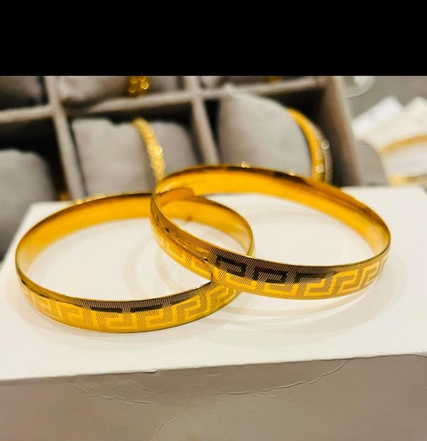 Brand inspired 21 karat gold plated stainless (kara) bangles